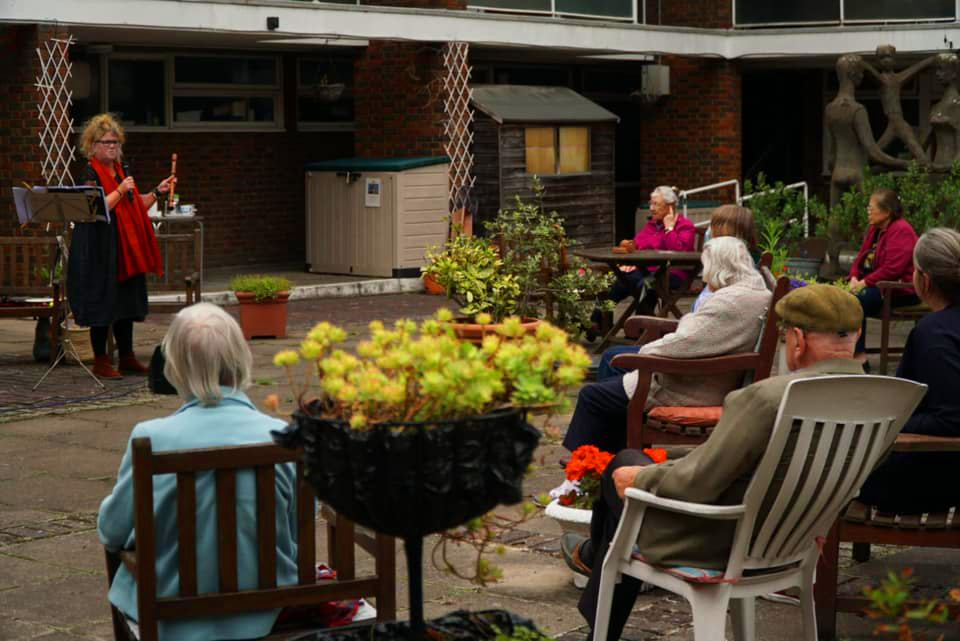 Musicians Performing for audience at care home