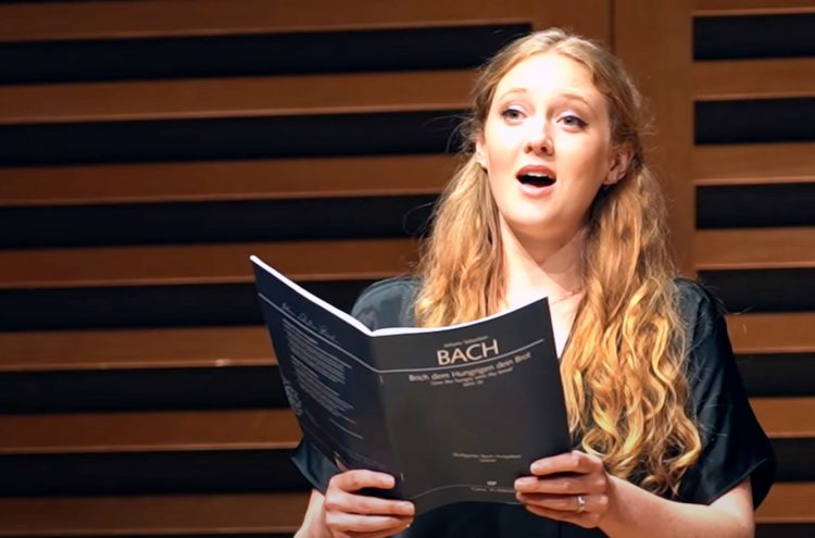 Capture of Bethany Horak-Hallet singing at Acland Burghley School.